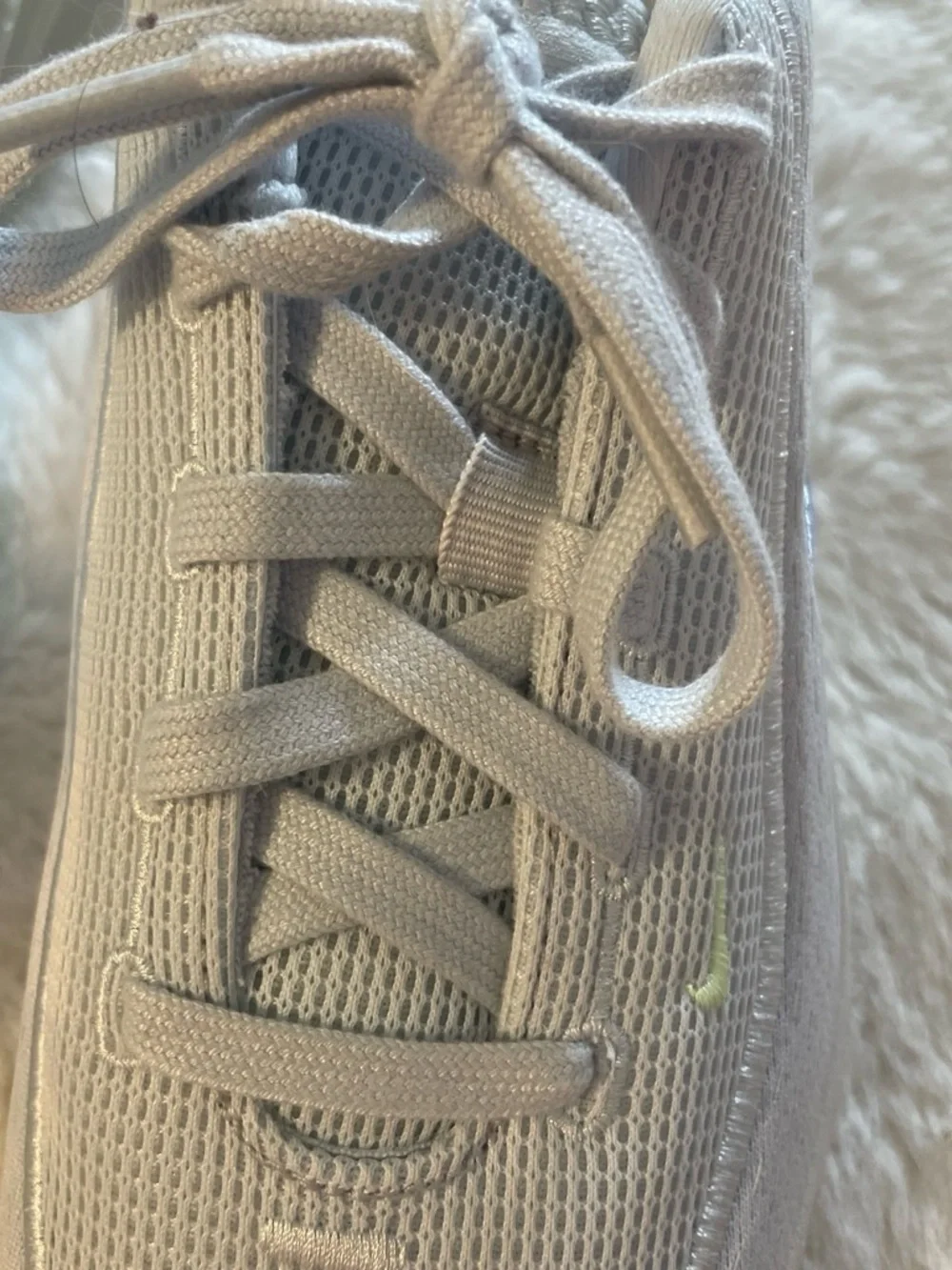 Nike White and Light Gray Sneakers with Subtle Black Swoosh